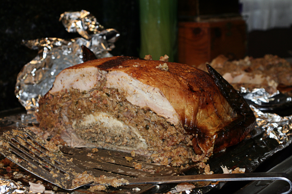 Sliced turducken in aluminum foil