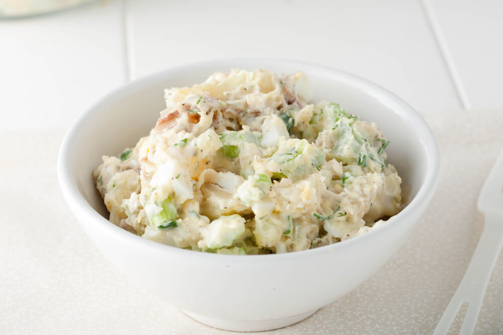 creamy amish potato salad in a bowl