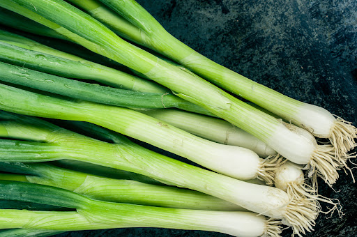 a bunch of green onions